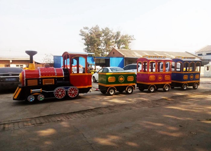 Quality Pollution Free Trackless Train Amusement Ride With Smoke Steam Spray Device for sale