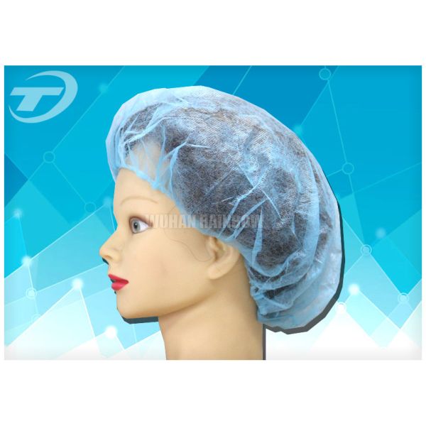 Disposable surgical bouffant cap , made from SPP fabric , blue color , various size
