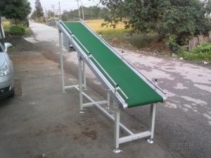 China                  Pallet Lifting and Carrying Printing Bottles Vertical Lifting Conveyor              on sale