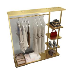 China Luxury Retail Store Display Fixtures Shelves Gold Clothing Metal Clothing Rack Wheels on sale