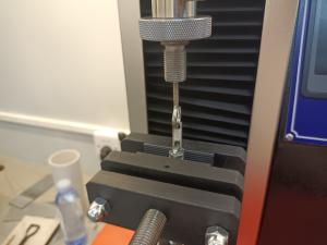 Quality ASTM D2061 Standard Universal Testing Machine 2KN Tensile Strength Measuring Machine UTM Desktop for sale