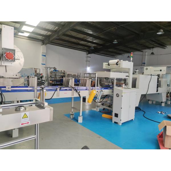 High Speed Automatic bottle shrink sleeve wrapping machine with bottle arrangement function