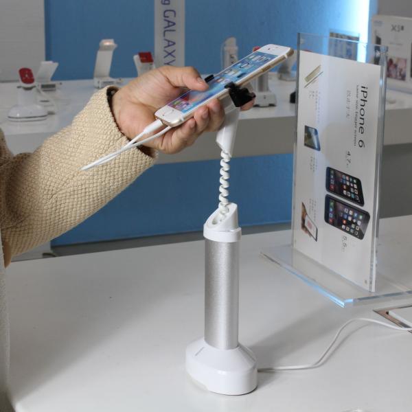 Buy COMER new mobile phone anti-lost alarm counter display stand with high security gripper locker at wholesale prices