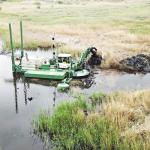 Diesel Power Type Multipurpose Amphibious Bucket Dredger with 120m3-700m3/h